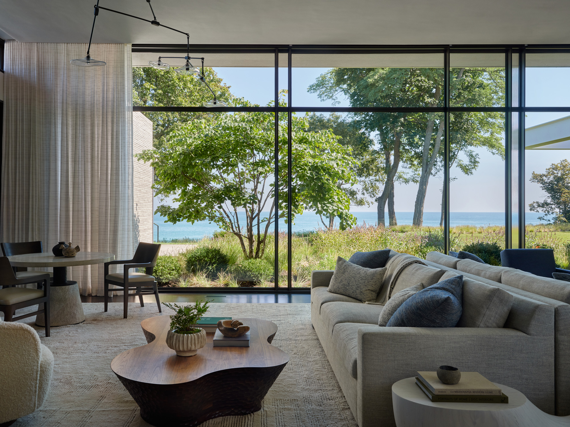 Robbins-Architecture-Project-Shoreline-Reflections-Living-Room-Backyard-Lake-View